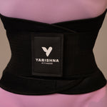 Close-up of the Yarishna Waist Trainer worn at the waist, front view with logo
