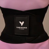 Close-up of the Yarishna Waist Trainer worn at the waist, front view with logo