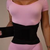 Wrapping the outer band of the Yarishna Waist Trainer