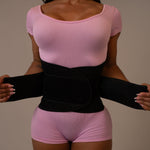 Adjusting the double velcro band of the Yarishna Waist Trainer